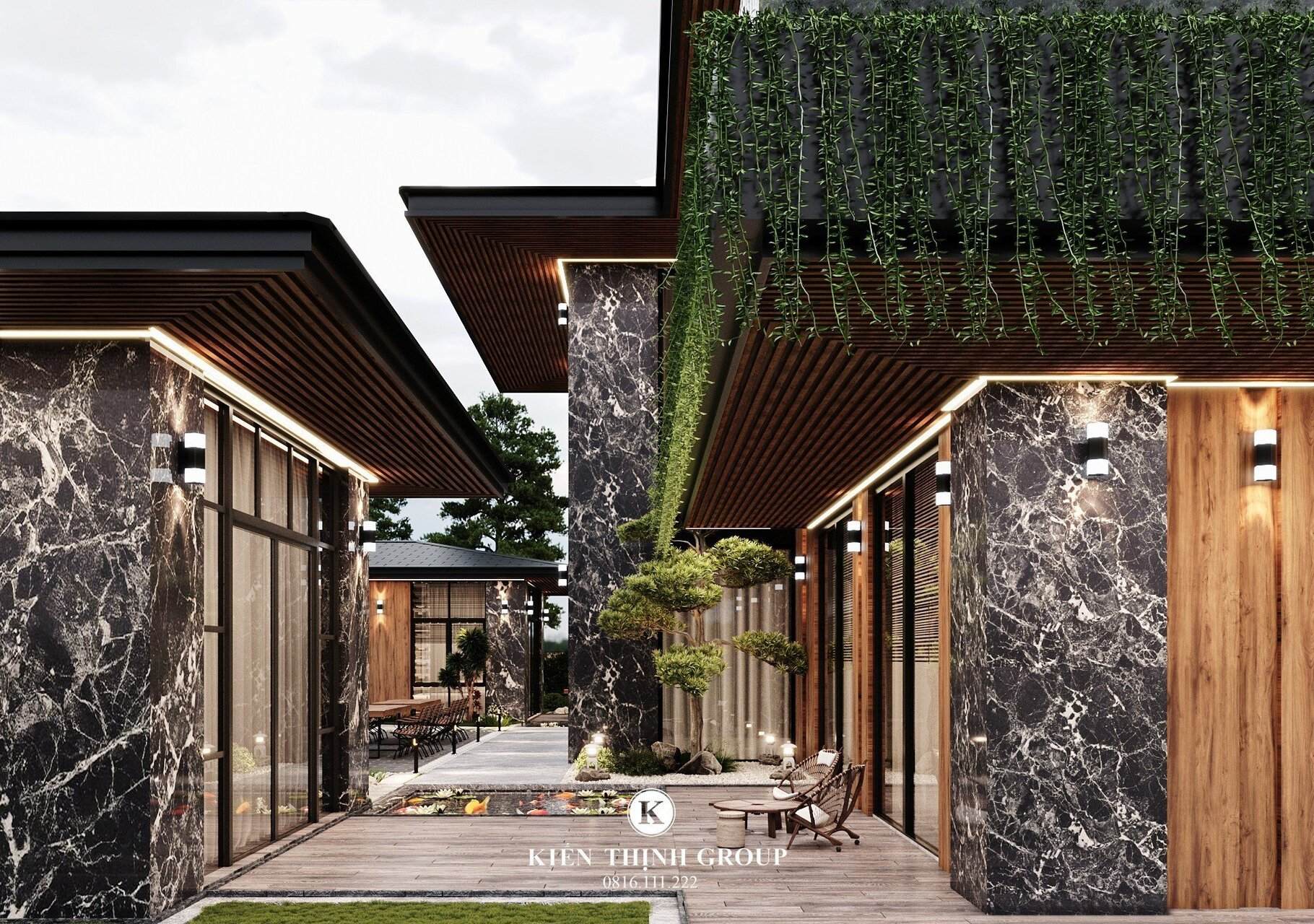 Bồn cây xanh được thiết kế xung quanh căn biệt thự hiện đại 2 tầng đẹp tại Quảng Ngãi